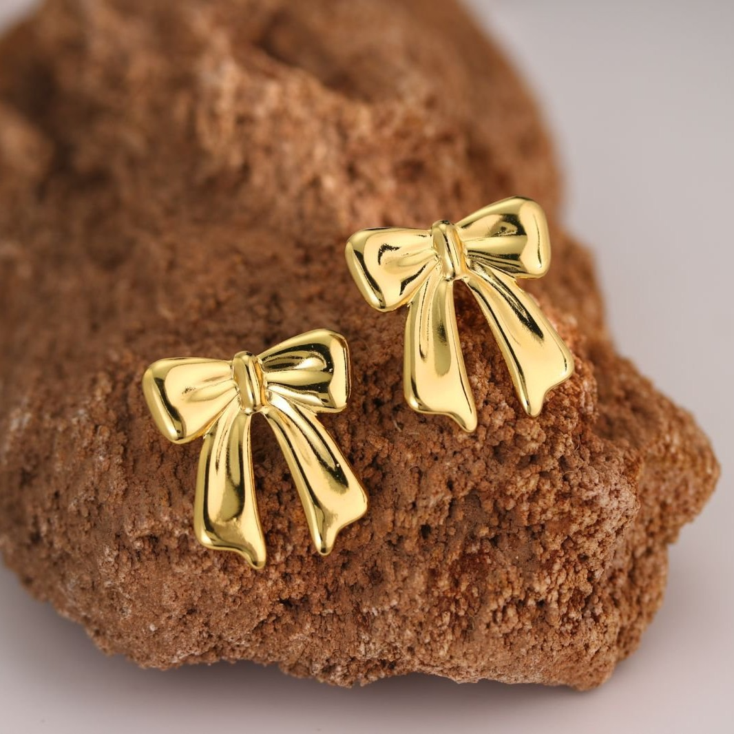 Gold Puffy Bow Stud Earrings