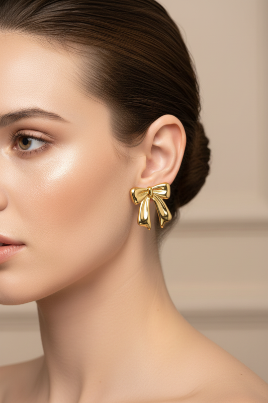 Gold Puffy Bow Stud Earrings – White Model Campaign
