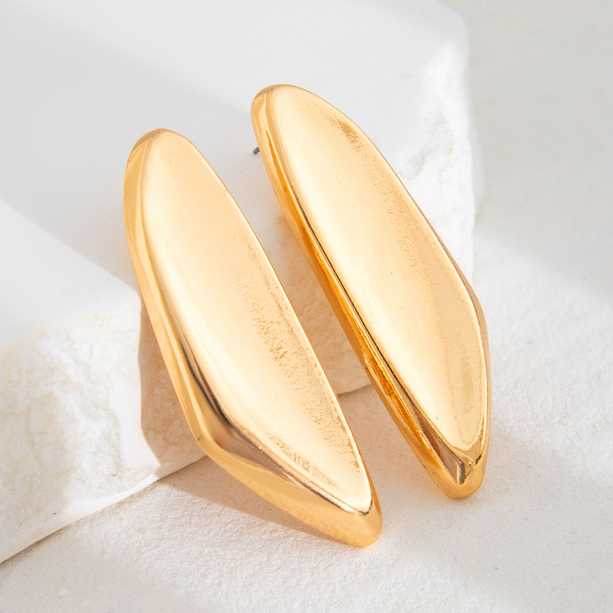 Gold Oversized Leaf Blade Statement Earrings