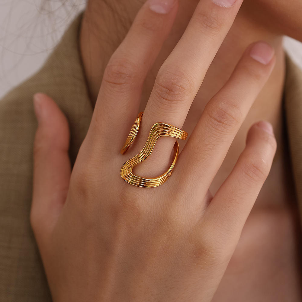 Gold Ridged Wave Loop Statement Ring