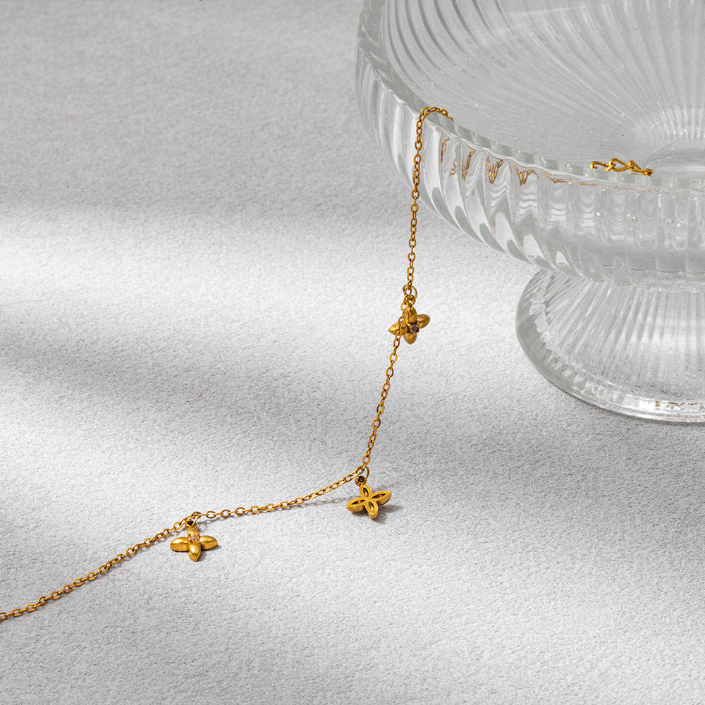 Gold Four-Petal Charm Bracelet