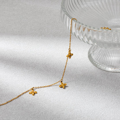 Gold Four-Petal Charm Bracelet