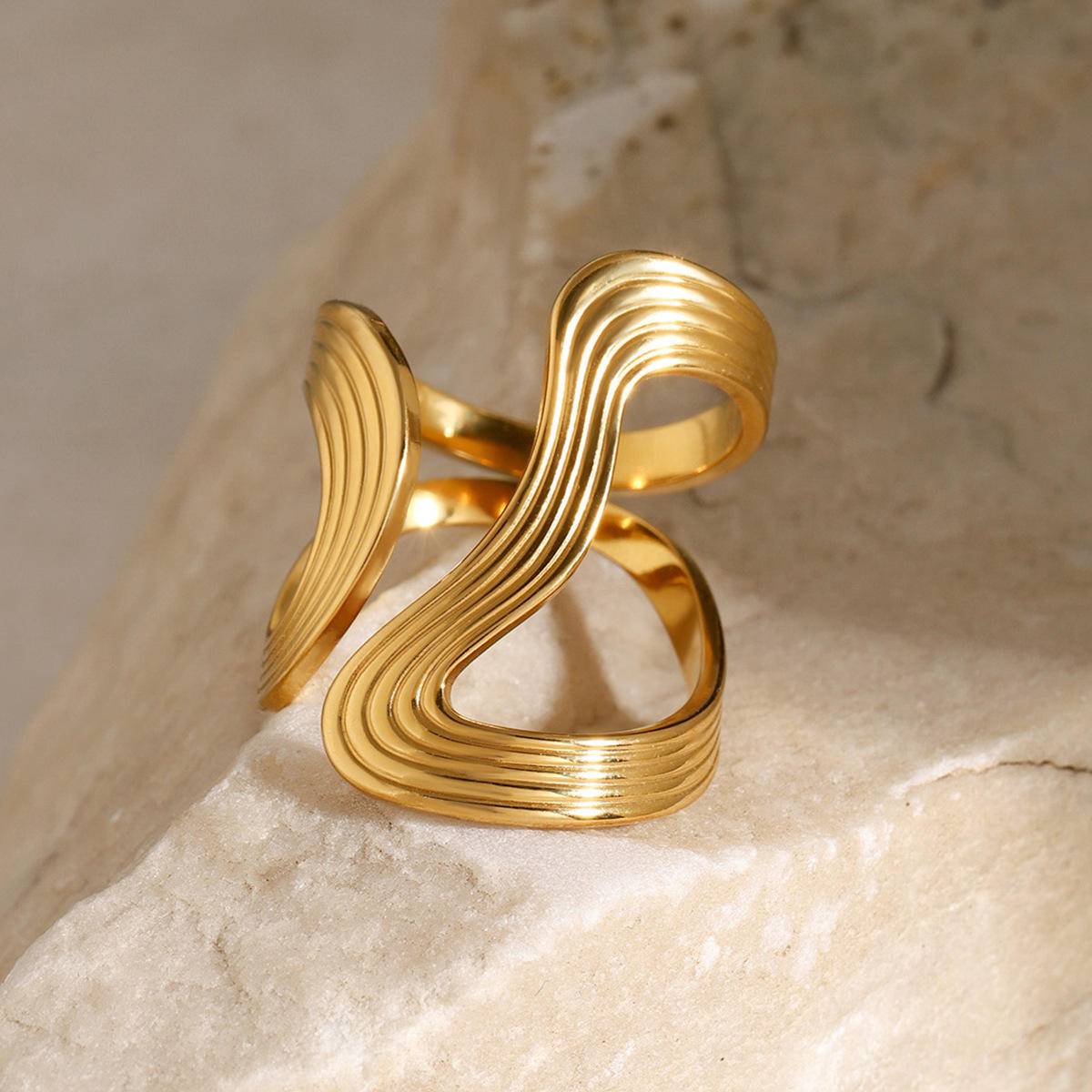 Gold Ridged Wave Loop Statement Ring