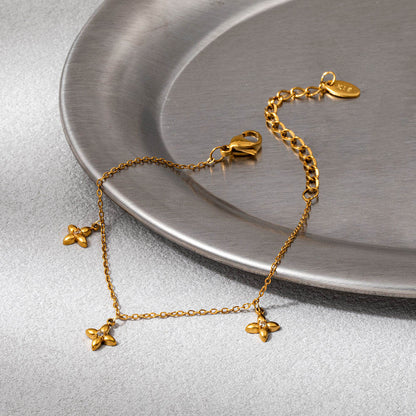 Gold Four-Petal Charm Bracelet
