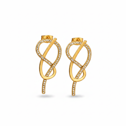 Gold Infinity Knot Pavé Earrings on white background