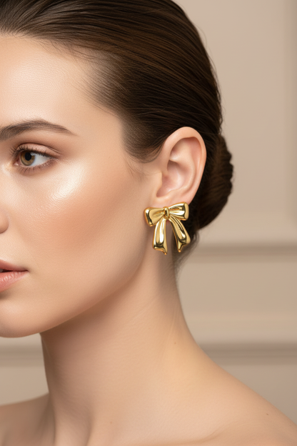 Gold Puffy Bow Stud Earrings – White Model Campaign