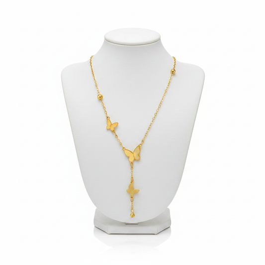 Gold Triple Butterfly Lariat Necklace on White Mannequin